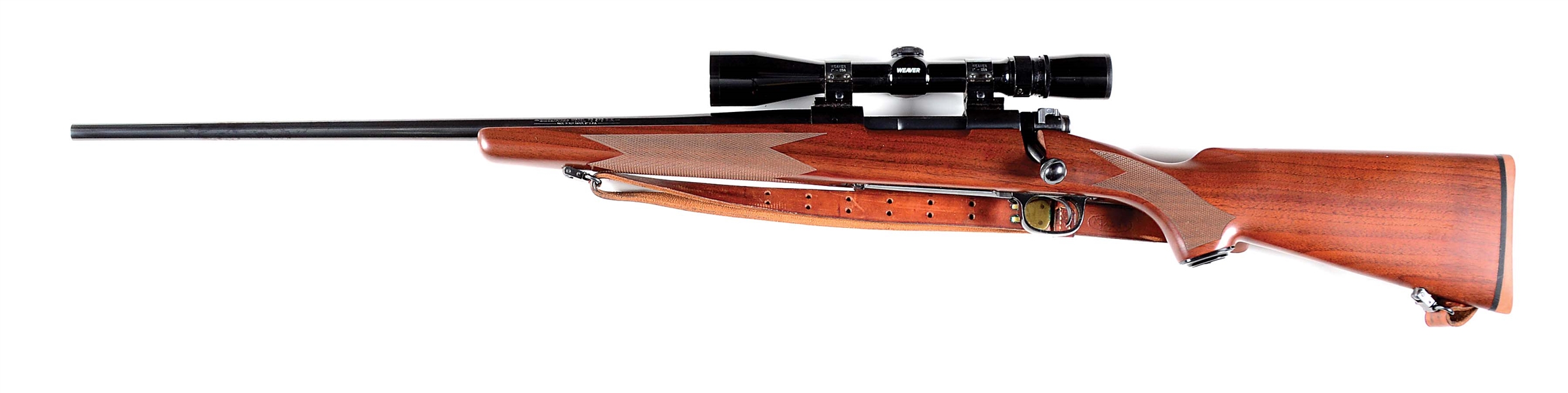 (M) LEFT HAND WINCHESTER MODEL 70 CLASSIC SPORTER WITH WEAVER SCOPE.