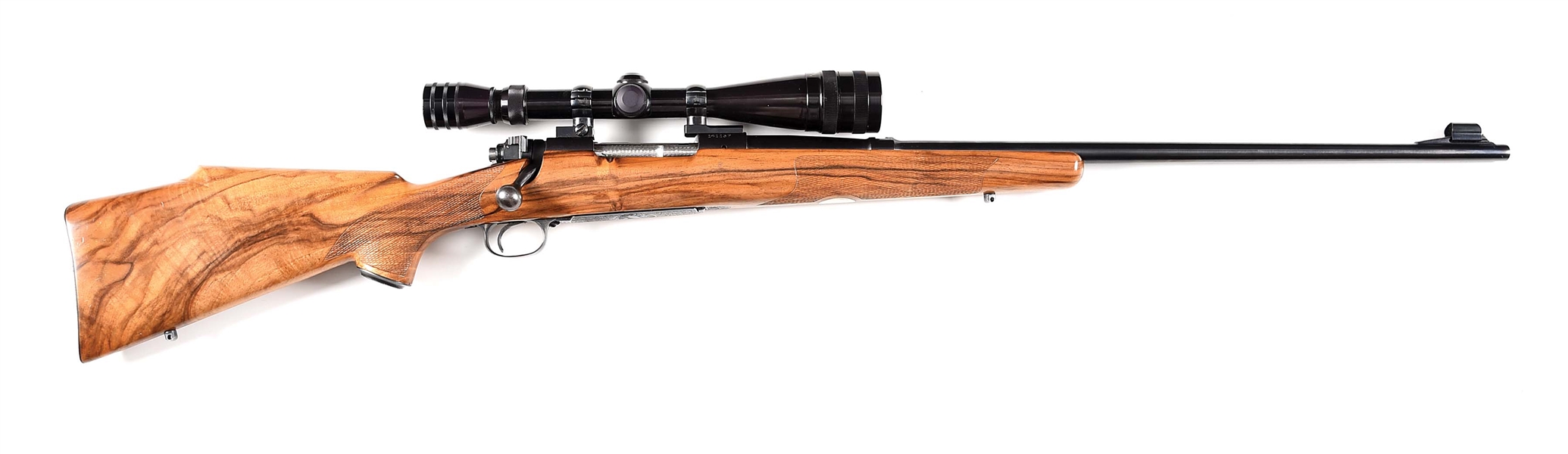 (M) WINCHESTER MODEL 70 BOLT ACTION RIFLE RECHAMBERED IN .300 WEATHERBY MAGNUM.