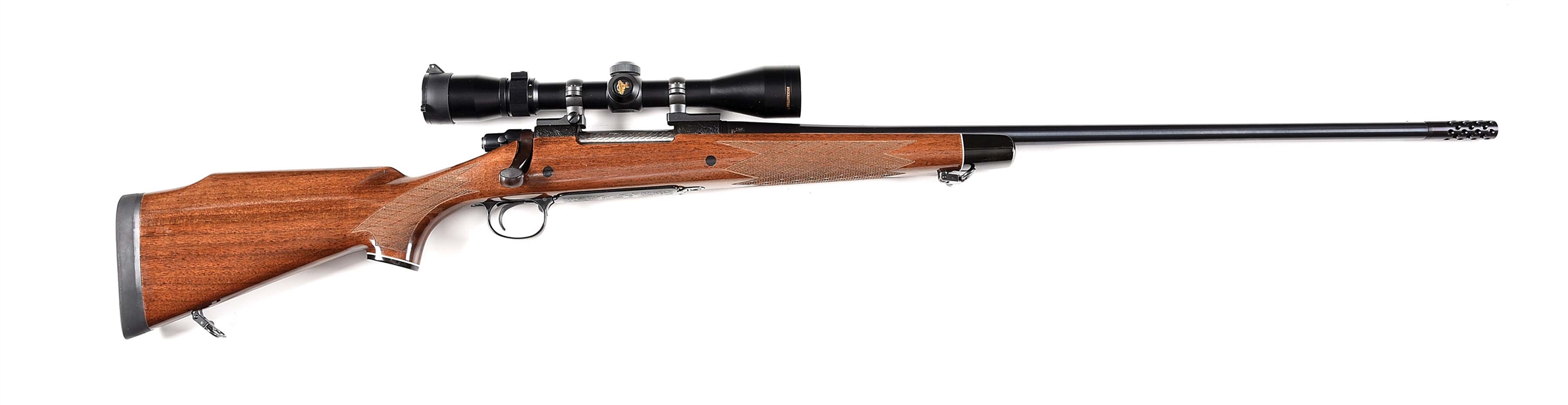 (M) REMINGTON MODEL 700 DELUXE ENHANCED RECIEVER BOLT ACTION RIFLE WITH SCOPE.