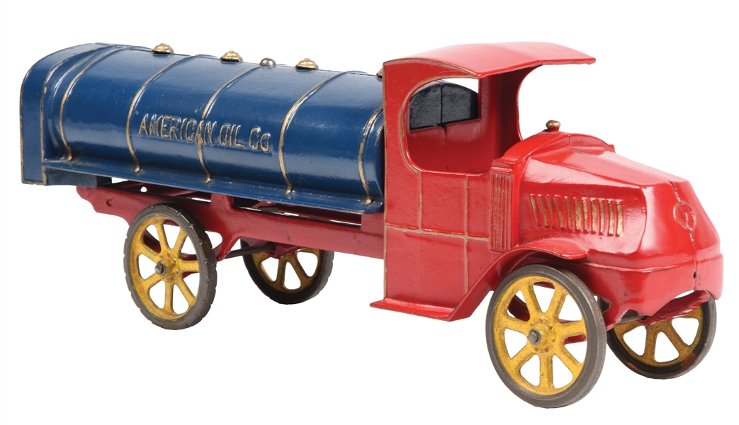 CAST IRON DENT AMERICAN OIL CO TOY TRUCK.