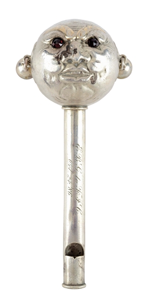 VICTORIAN STERLING SILVER BABY RATTLE WITH MANS FACE WITH RUBY EYES.