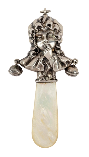 VICTORIAN STERLING SILVER BABY RATTLE GIRL WITH FINGER ON LIPS.
