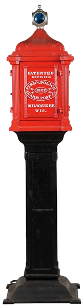 CAST-IRON FIRE ALARM AND POLICE CALL ALARM POST MOUNTED ON CAST IRON POLE. 