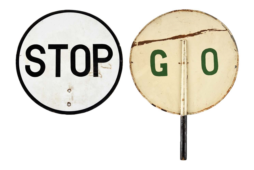 LOT OF 2: PADDLE-STYLE STOP AND GO SIGNS.