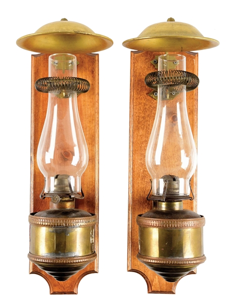 PAIR OF WALL MOUNTED OIL LAMPS.