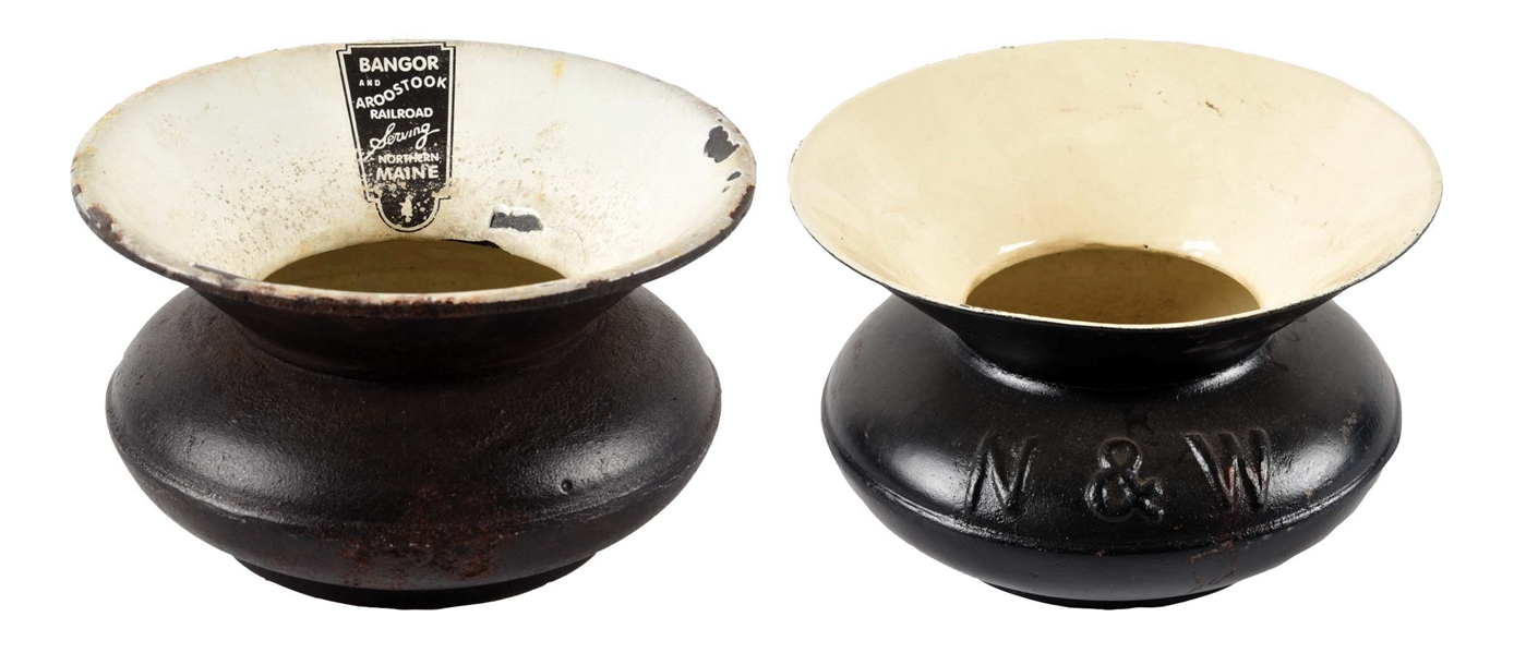LOT OF 2: CAST-IRON SPITTOONS WITH PERSONALIZED RECEPTACLES.