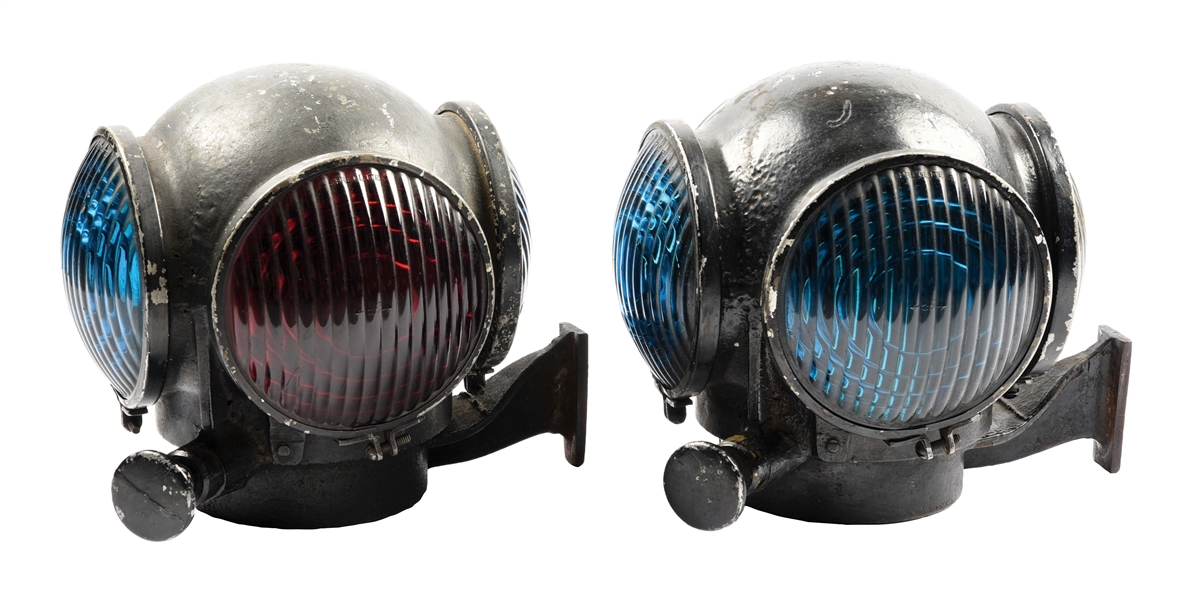 PAIR OF ADLAKE CAST-IRON CANNONBALL LAMPS.