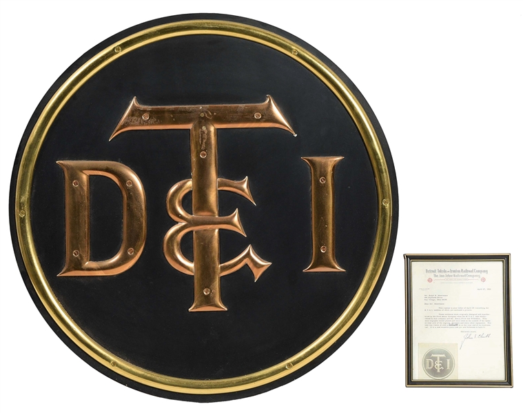 DT&I BRASS LOGO MOUNTED WITH PROVENANCE.