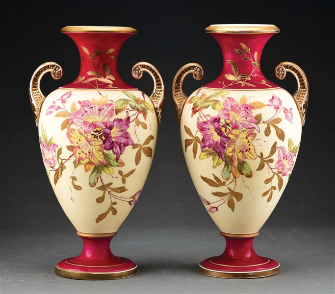 PAIR OF PORCELAIN LILY VASES.