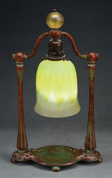 TIFFANY STUDIOS PULLED FEATHER SHADE AND BRONZE TABLE LAMP.