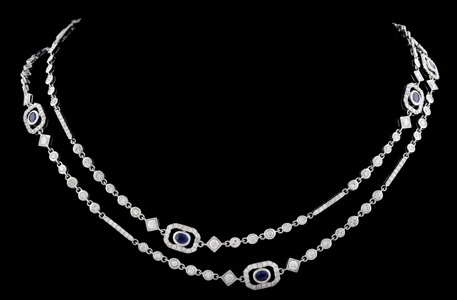 LADIES 18K WHITE GOLD SAPPHIRE AND DIAMOND STATION NECKLACE.