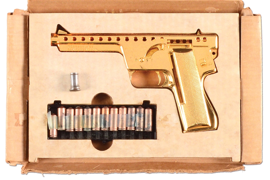 (C) VERY RARE GOLD PLATED MB ASSOCIATES GYROJET MODEL 137 WITH BOX AND INERT AMMUNITION.