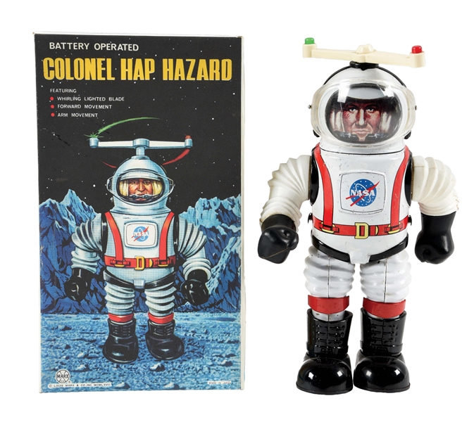 JAPANESE BATTERY OPERATED TIN LITHO AND PLASTIC COLONEL HAP HAZARD ASTRONAUT TOY.