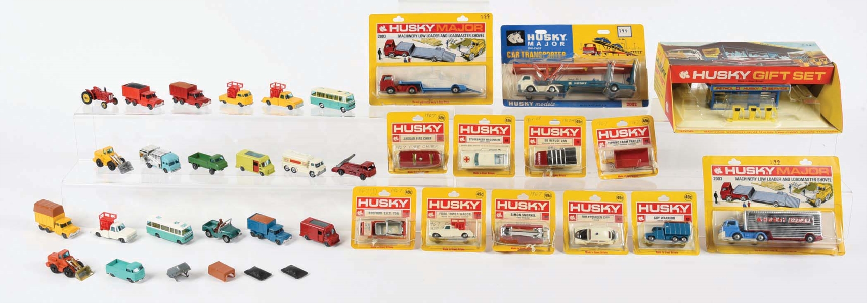 ASSORTED LOT OF DIE-CAST HUSKY VEHICLE TOYS.