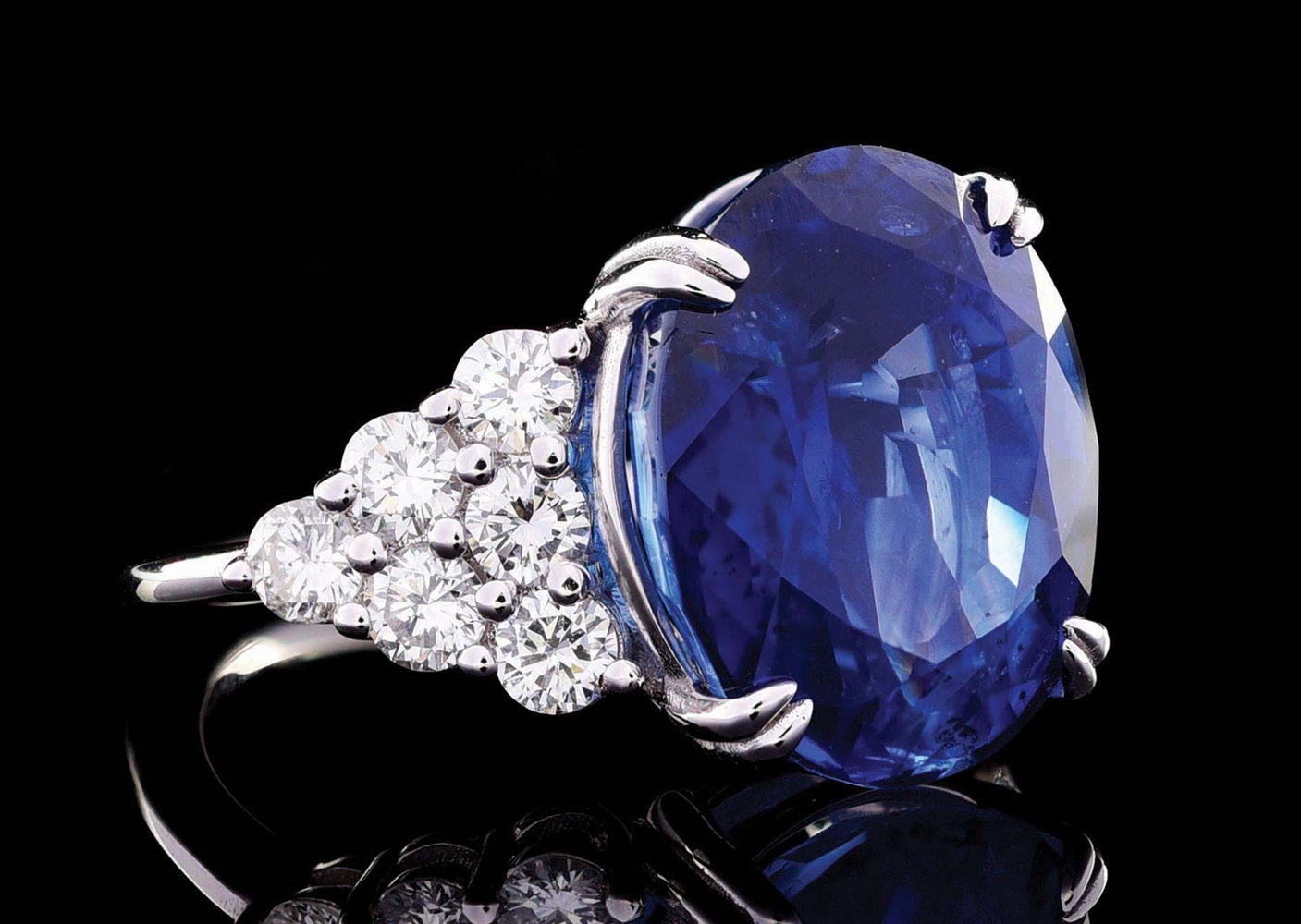 18K WHITE GOLD 13.70CT BLUE SAPPHIRE AND DIAMOND RING W/GIA REPORT.