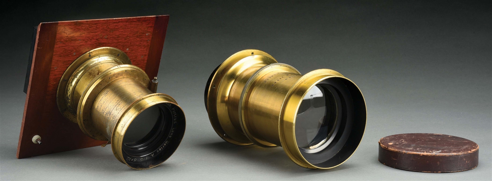 PAIR OF LARGE FORMAT BRASS PORTRAIT LENSES SWEET & WALLACH AND WOLLENSAK.