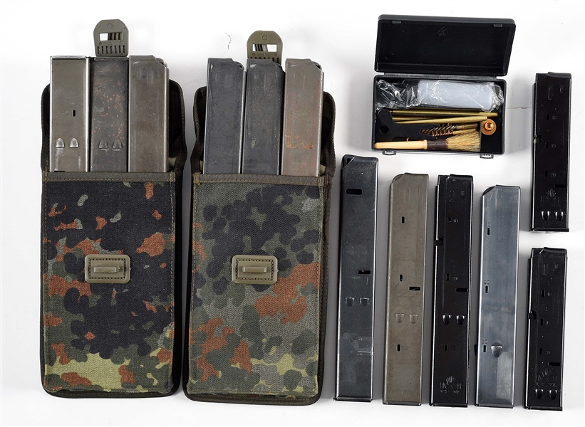 LOT OF 15: UZI MAGAZINES, MAG POUCHES AND CLEANING KIT.