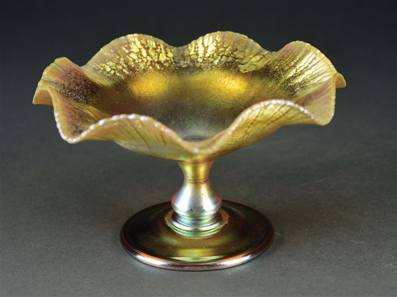 TIFFANY STUDIOS FAVRILE GLASS FOOTED DISH.