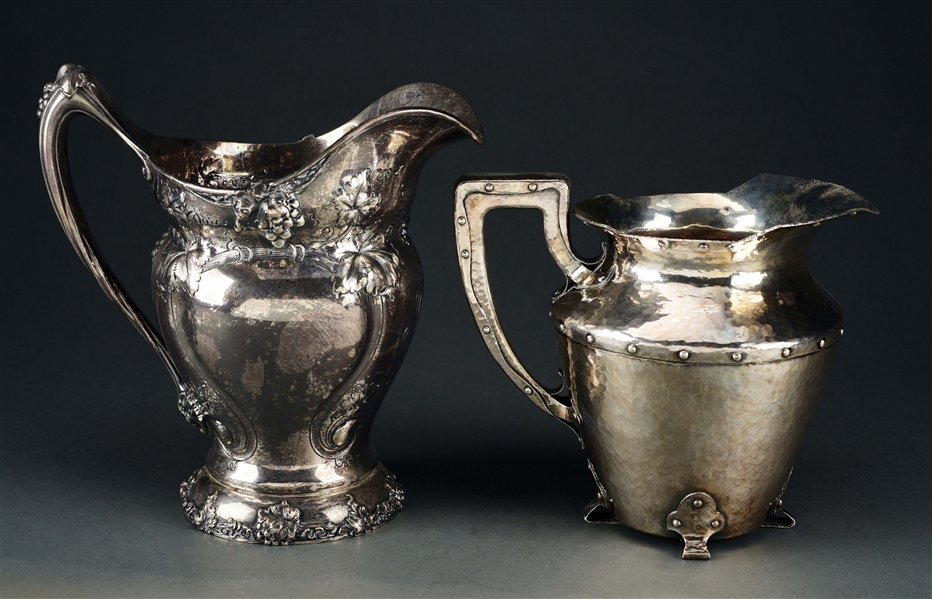 TWO AMERICAN STERLING WATER PITCHERS.