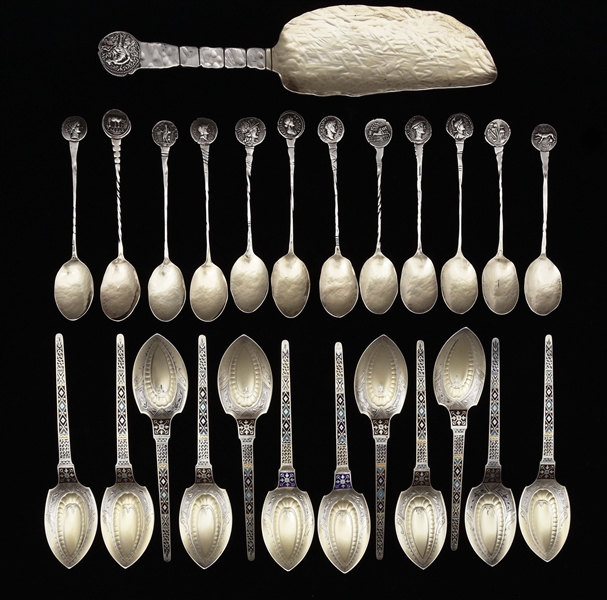 A SET OF 12 GORHAM STERLING AND ENAMEL ICE CREAM SPOONS.