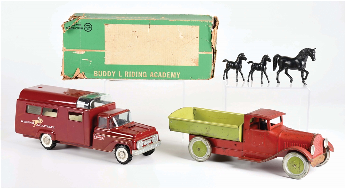 LOT OF 2: AMERICAN MADE PRESSED STEEL POST AND PRE-WAR VEHICLE TOYS.