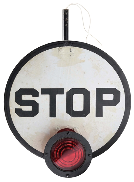 TWO-SIDED MAGNETIC FLAGMAN PORCELAIN STOP SIGN.