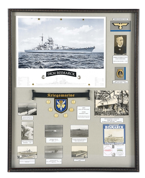 FRAMED DKM BISMARCK DISPLAY INCLUDING KRIEGSMARINE CAP TALLY, BREAST EAGLE, BUTTONS, AND PHOTOGRAPHS.