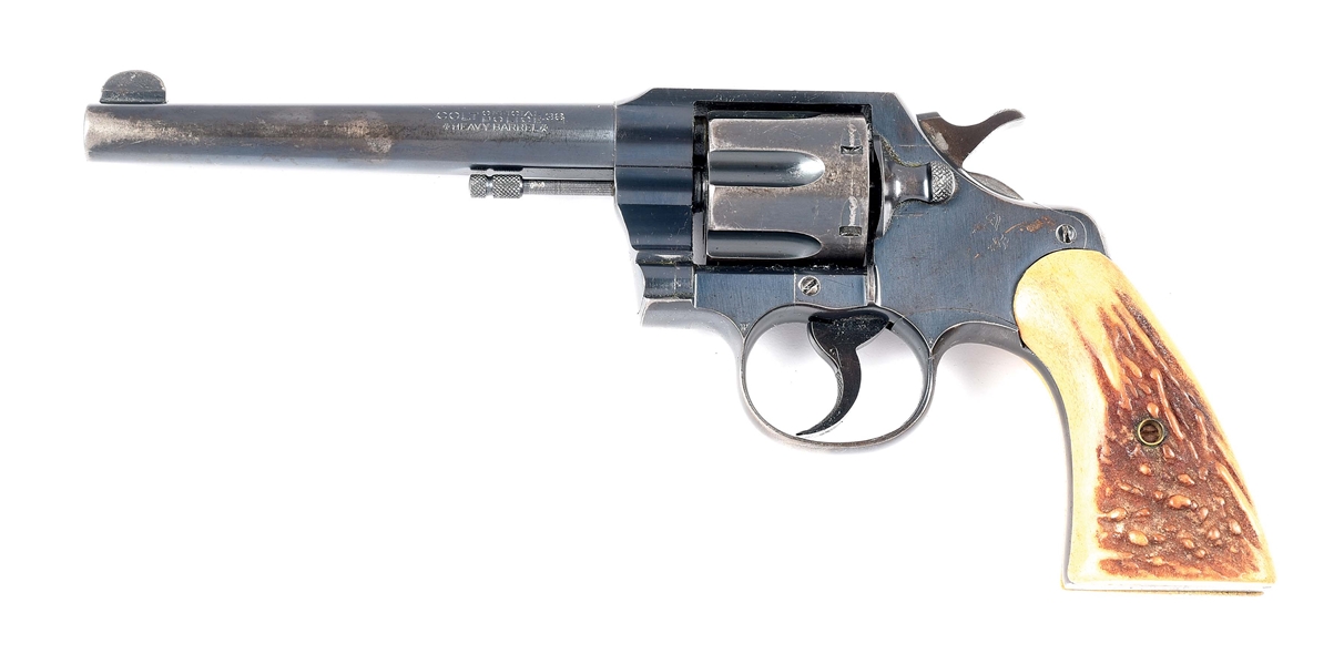 (C) WAR TIME PRODUCTION COLT OFFICIAL POLICE HEAVY BARREL DOUBLE ACTION REVOLVER.