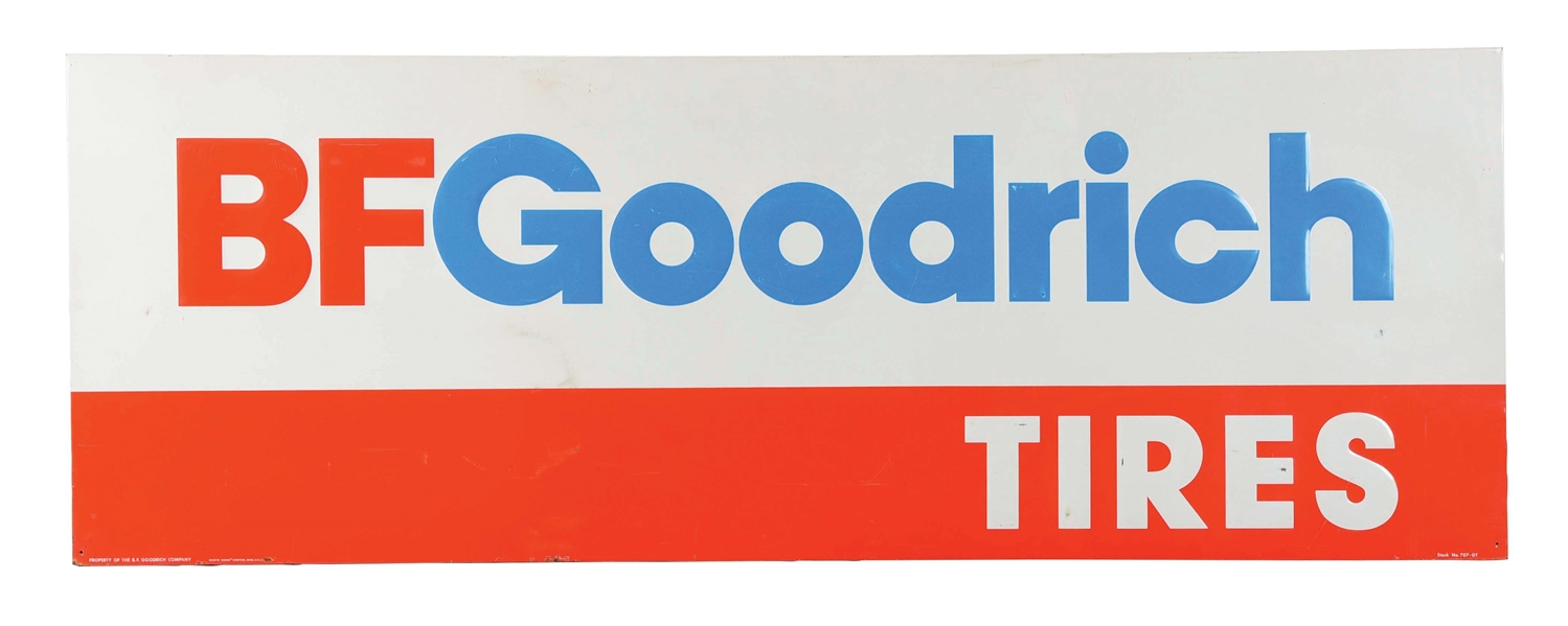 NEW OLD STOCK B.F. GOODRICH TIRES EMBOSSED TIN SIGN W/ ORIGINAL WOOD BACKING. 
