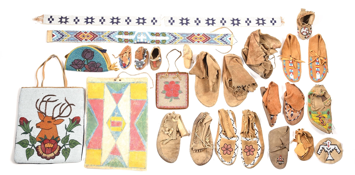 LARGE LOT OF MISCELLANEOUS NATIVE AMERICAN MOCCASINS, PARFLECHE, AND PLATEAU BAGS.
