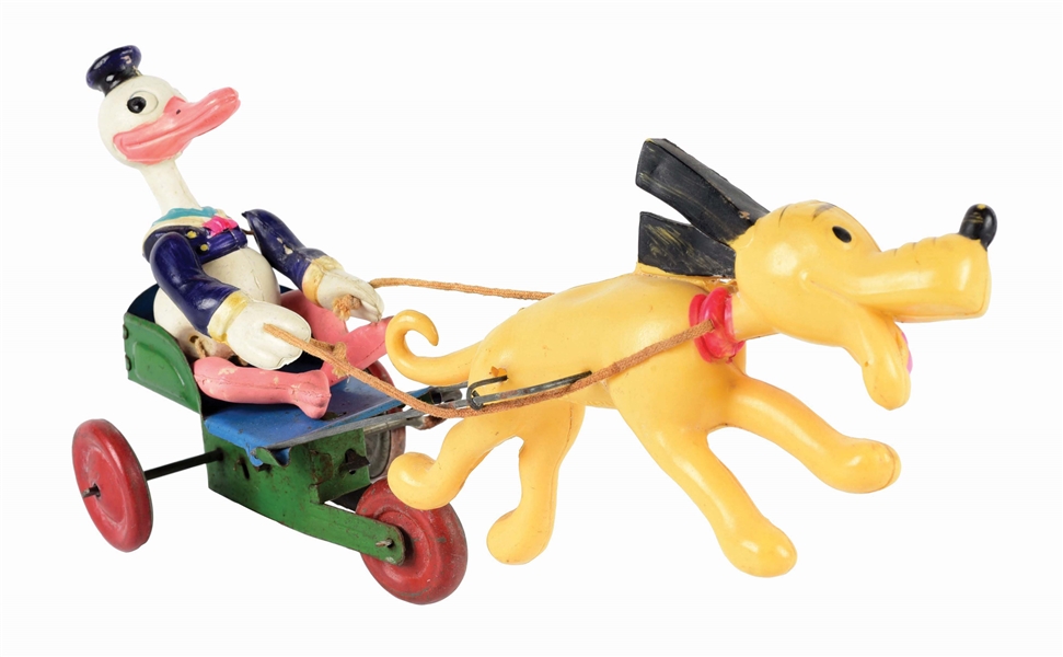 JAPANESE PRE-WAR CELLULOID WALT DISNEY DONALD DUCK BEING PULLED IN CART BY PLUTO.