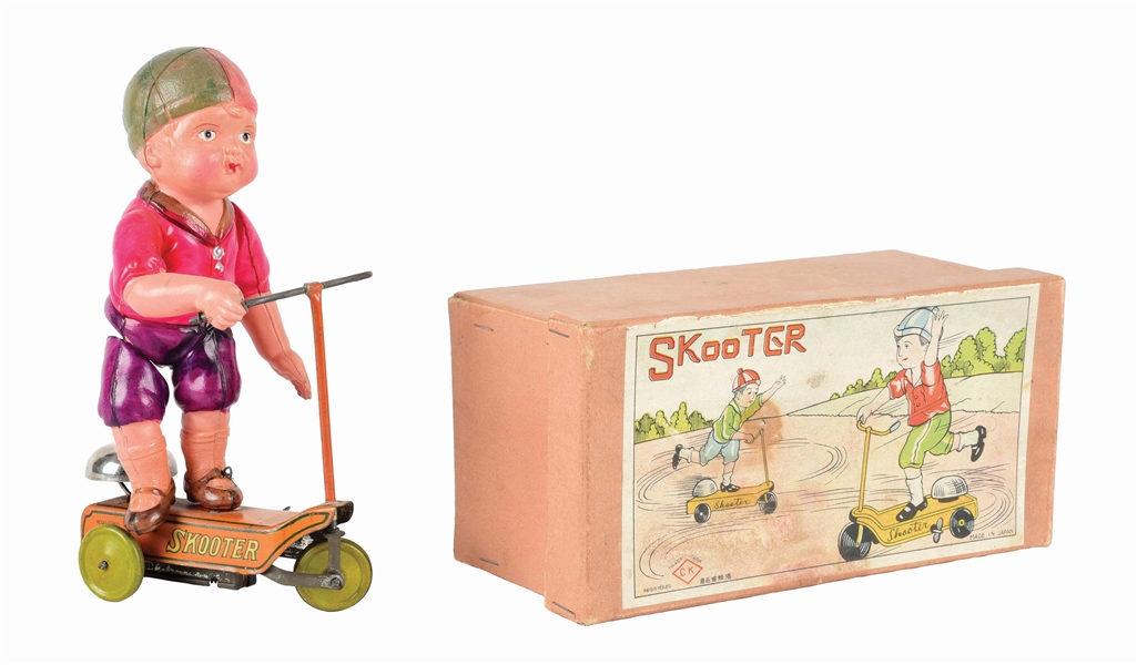SCARCE PRE-WAR JAPANESE TIN LITHO AND CELLULOID SKOOTER TOY.
