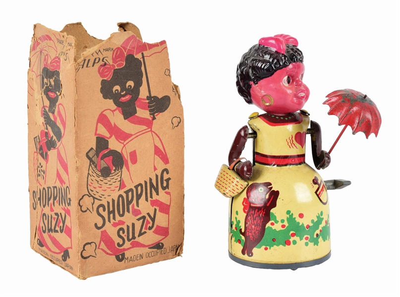 VERY SCARCE JAPANESE TIN LITHO AND CELLULOID AFRICAN AMERICAN SHOPPING SUZY WIND-UP FIGURE.
