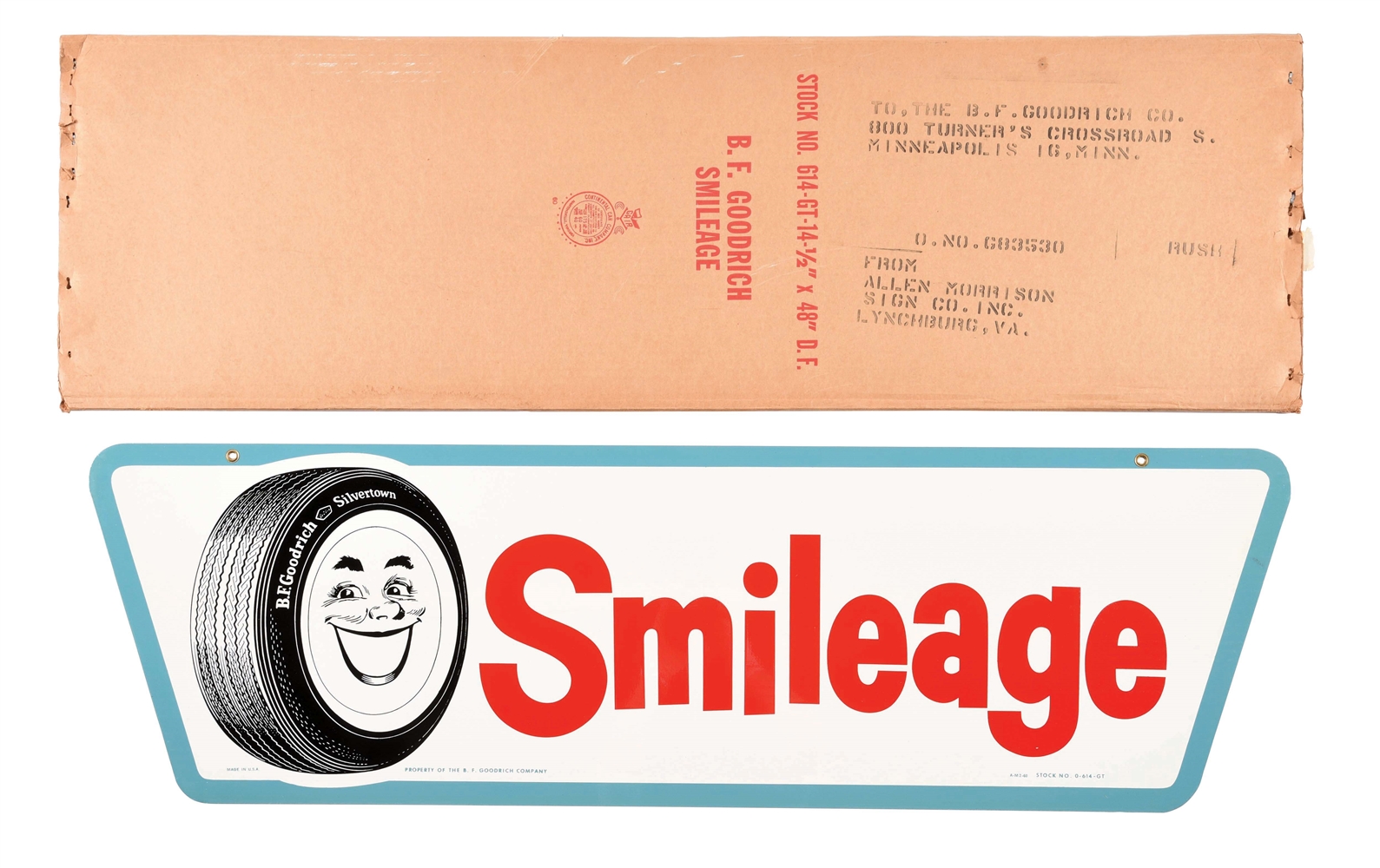 OUTSTANDING NEW OLD STOCK B.F. GOODRICH SMILEAGE TIRES TIN SIGN W/ ORIGINAL SHIPPING BOX. 