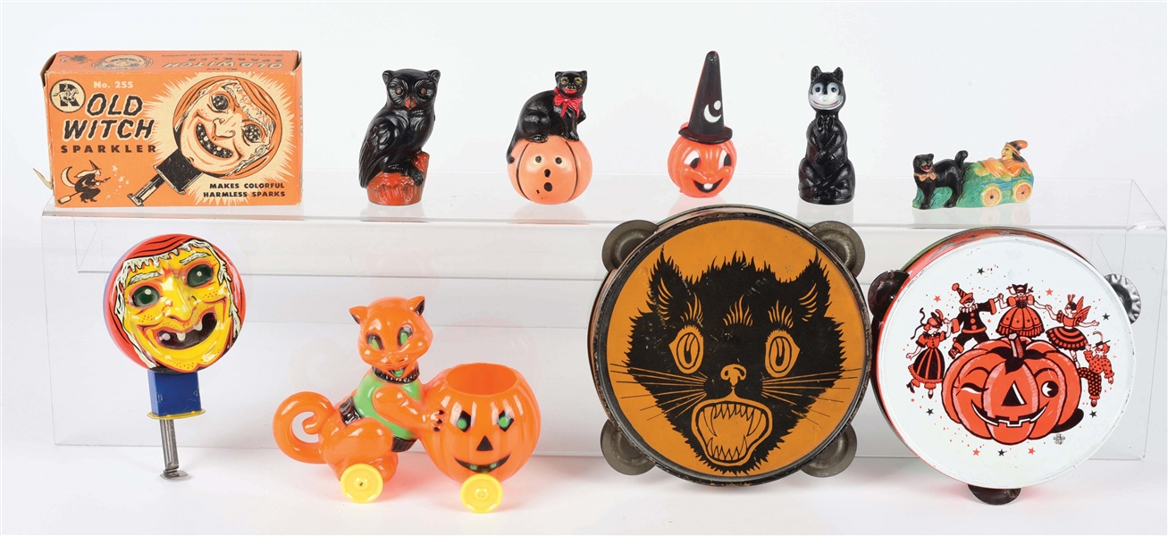 LOT OF 9: VARIOUS PLASTIC, CELLULOID AND TIN LITHO HALLOWEEN-RELATED ITEMS.