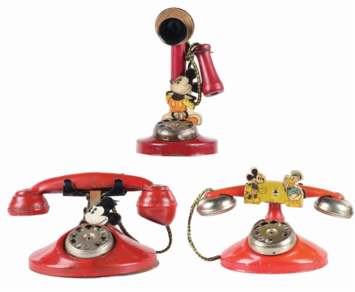 LOT OF 3: PRESSED STEEL AMERICAN MADE WALT DISNEY MICKEY MOUSE AND DONALD DUCK TOY PHONES.
