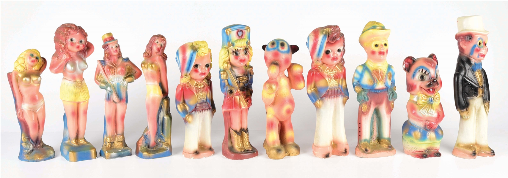 LOT OF 11: VARIOUS CHALK CARNIVAL FIGURES.