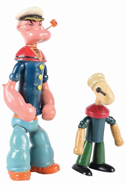 LOT OF 2: COMPOSITION AND WOOD JOINTED POPEYE FIGURES.