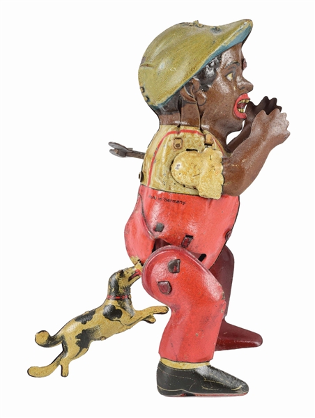 PRE-WAR GERMAN TIN LITHO AND HAND-PAINTED POOR PETE WIND-UP TOY.