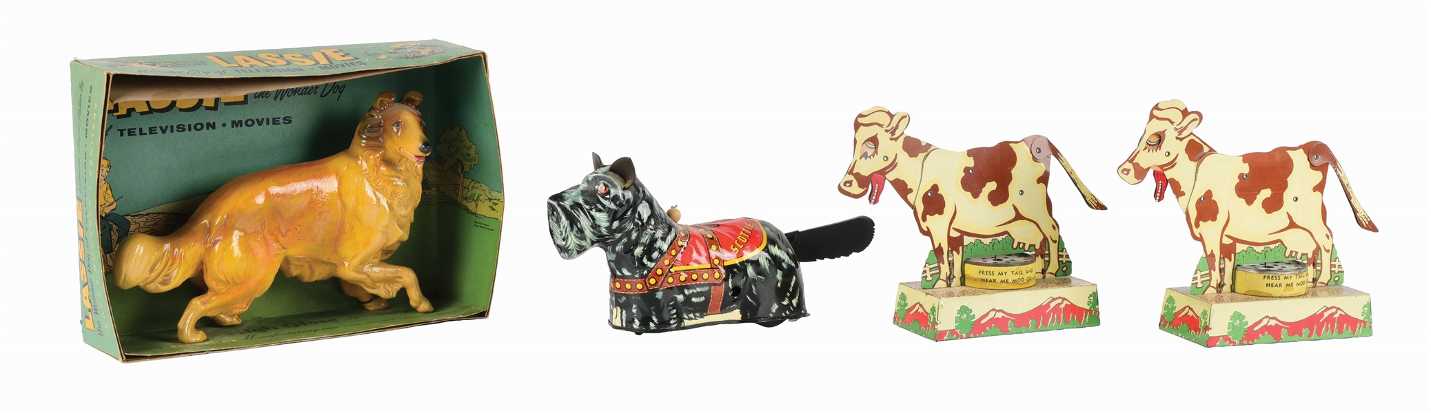 LOT OF 4: TIN LITHO AND RUBBER ANIMAL THEMED TOYS.