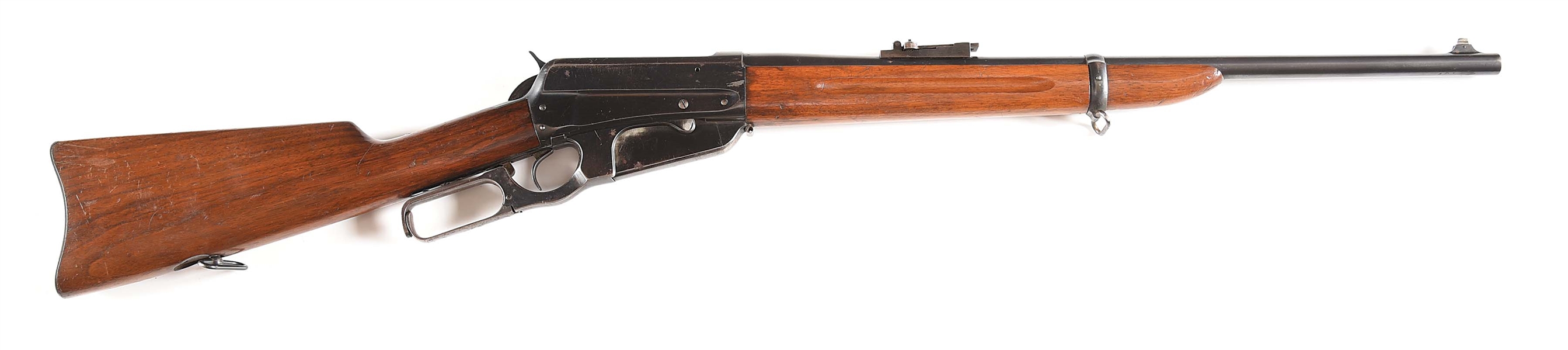 (C) WINCHESTER MODEL 1895 CARBINE LEVER ACTION RIFLE. 