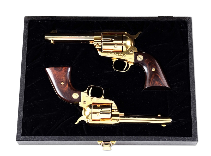 (C) CASED PAIR OF GOLD PLATED CHERRYS SPORTING GOODS 35TH ANNIVERSARY COLT FRONTIER SCOUT & SINGLE ACTION ARMY REVOLVERS WITH CASE.