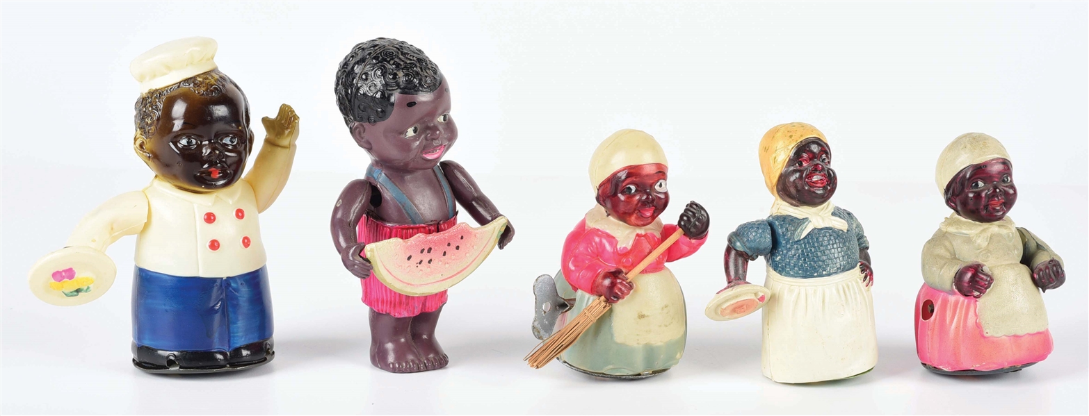 LOT OF 5: EARLY AFRICAN-AMERICAN THEMED CELLULOID WIND-UP TOYS.