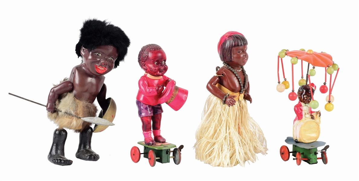 LOT OF 4: PRE-WAR CELLULOID ETHNIC-THEMED WIND-UP TOYS.