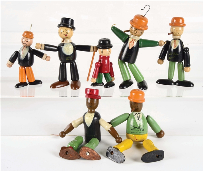 LOT OF 7: VARIOUS EARLY PRE-WAR WOOD JOINTED CHARACTER FIGURES.