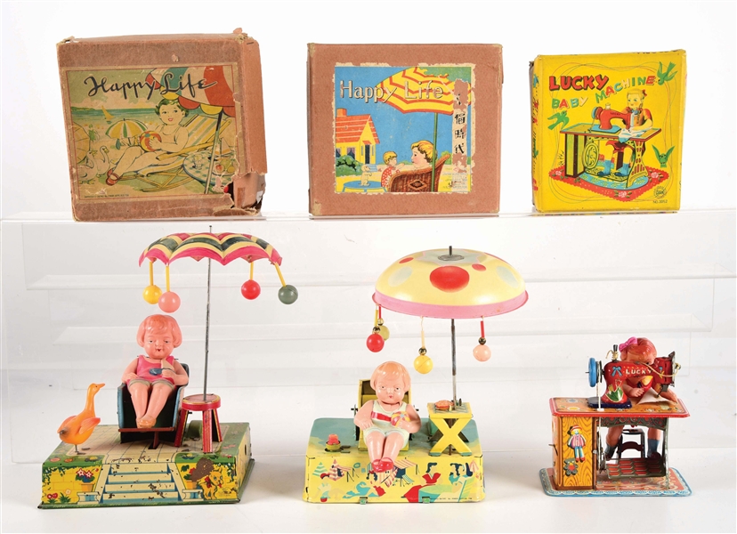 LOT OF 3: 1950S JAPANESE TIN LITHO AND CELLULOID WIND-UP TOYS.