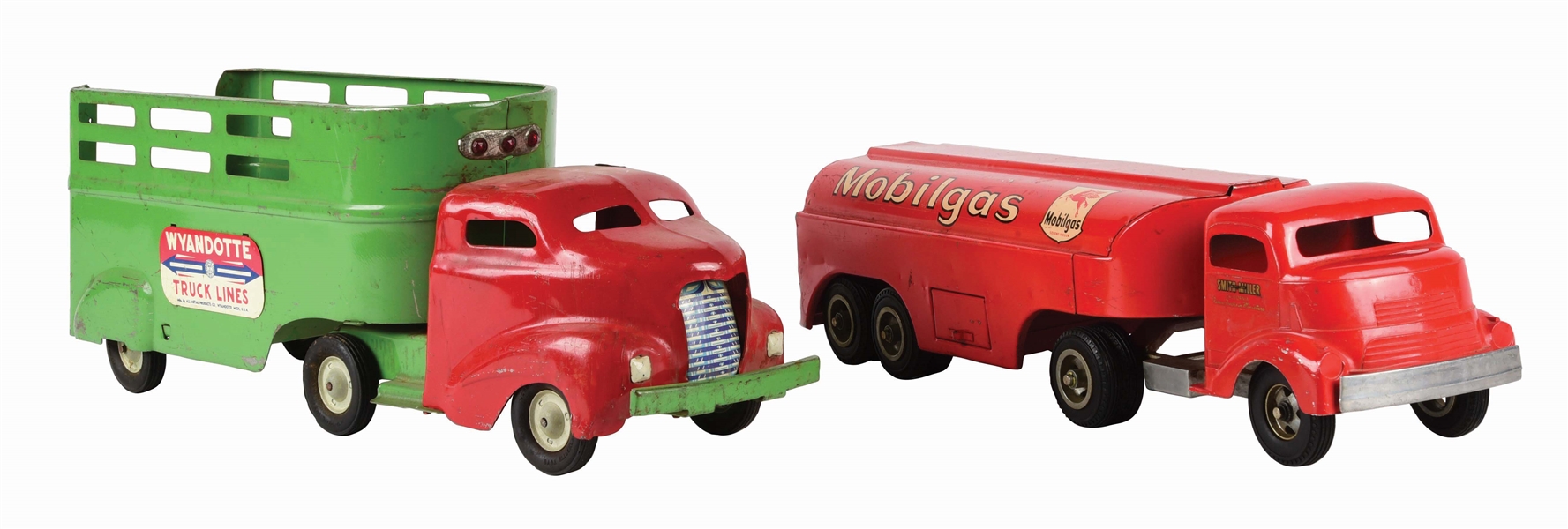 LOT OF 2: AMERICAN MADE PRESSED STEEL SMITH MILLER AND WYANDOTTE TRACTOR TRAILERS.