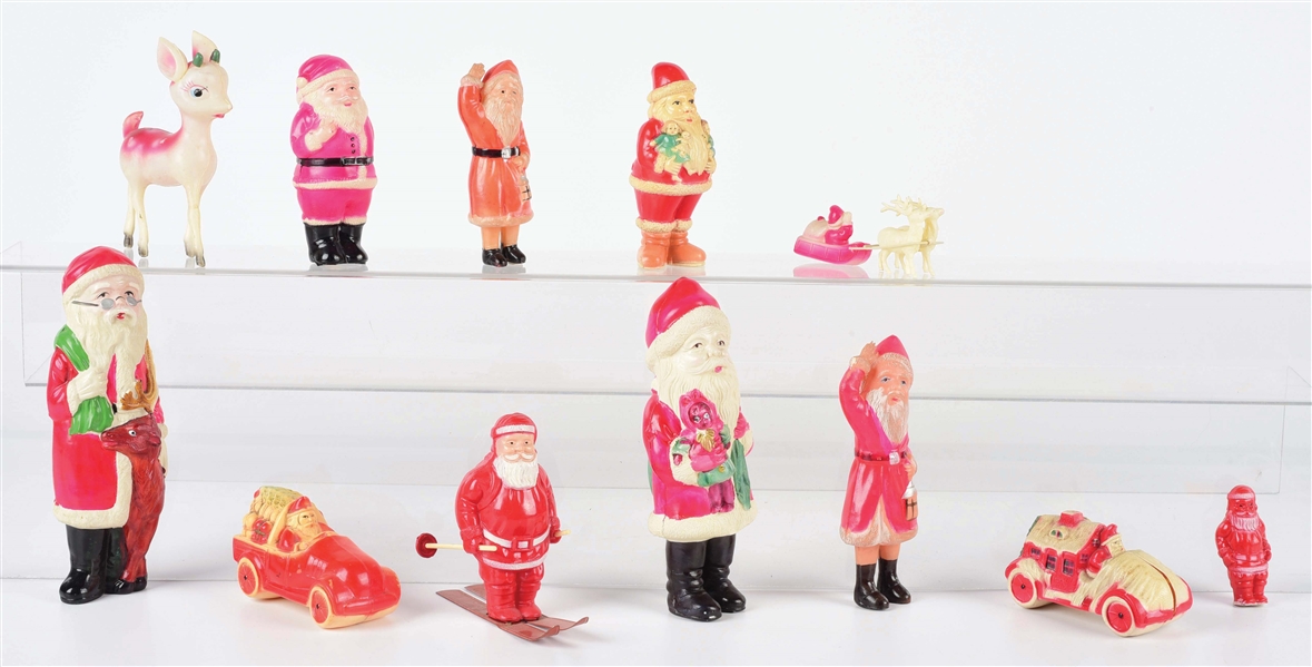 LOT OF 11: VARIOUS CELLULOID SANTA CLAUS AND OTHER CHRISTMAS-RELATED FIGURES.