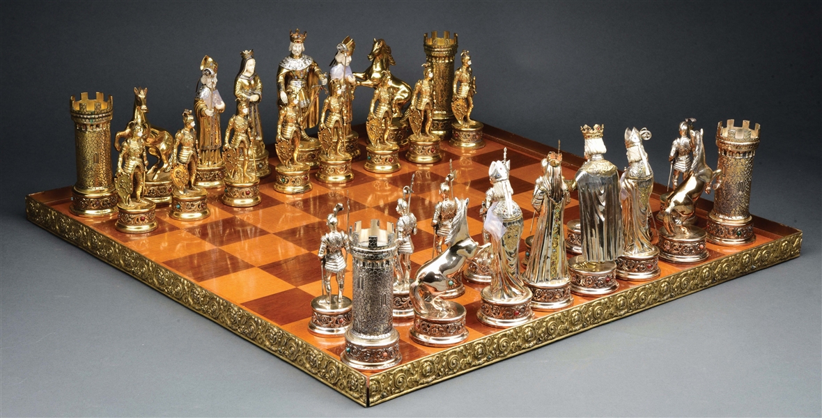 MAGNIFICENT STERLING SILVER CHESS SET.