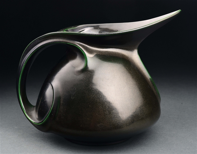 ART NOUVEAU FRENCH PITCHER WITH  STYLIZED HANDLE AND SPOUT.